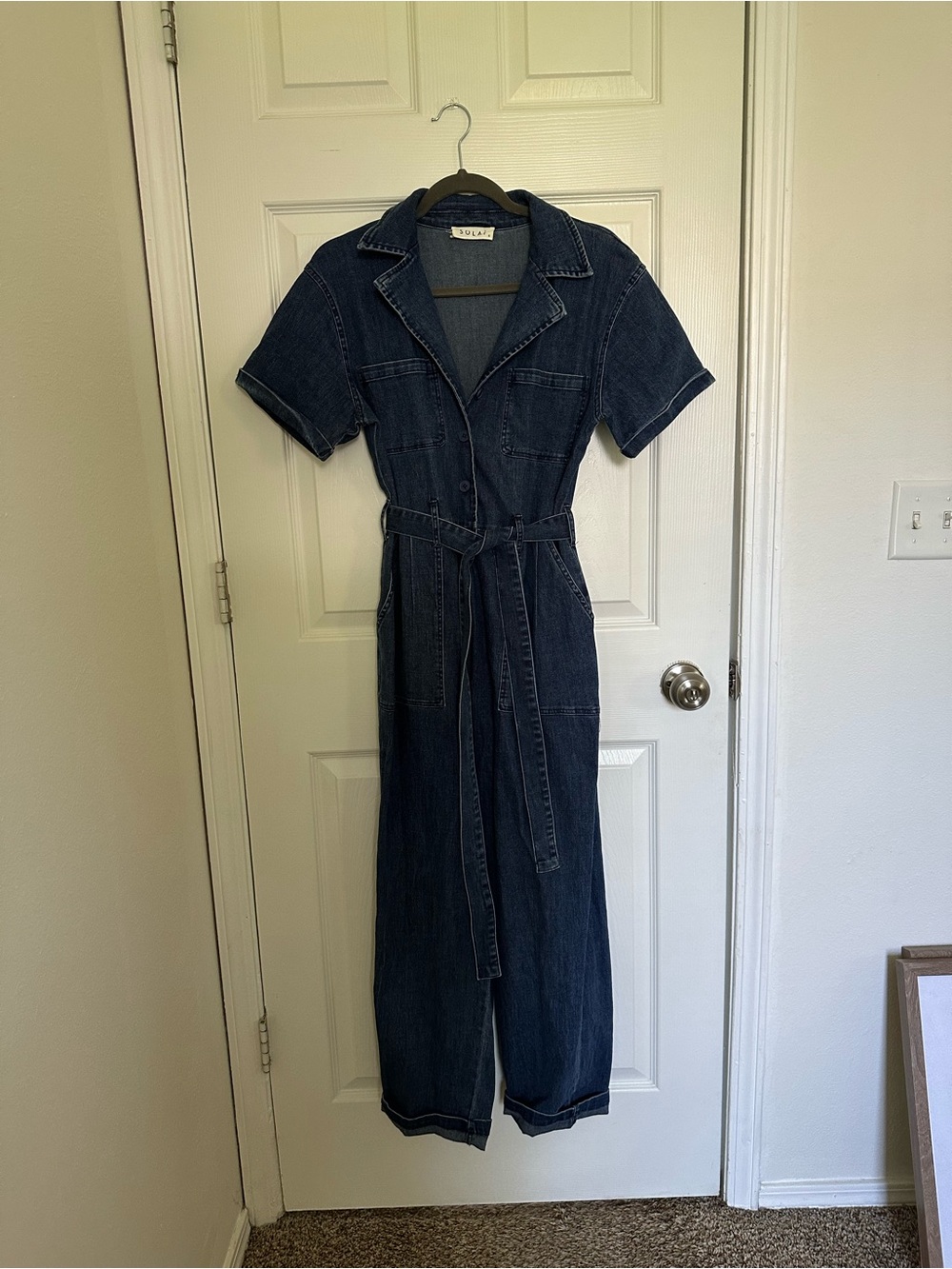 Vintage-Inspired Dark Blue Denim Jumpsuit with Tie Belt
